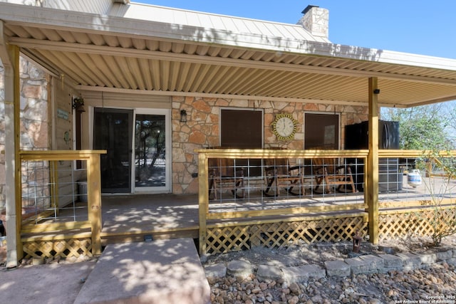 exterior space featuring a wooden deck