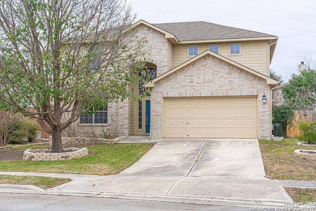 traditional-style home featuring a garage, concrete driveway, brick siding, and roof with shingles