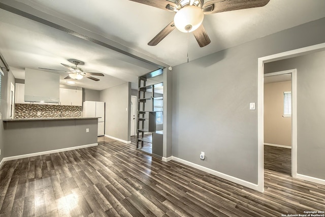 515 Park Mdw, San Antonio, TX 78227 - unfurnished living room with ceiling fan, baseboards, and dark wood-style flooring