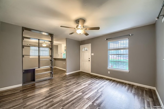 515 Park Mdw, San Antonio, TX 78227 - entryway featuring dark wood-style floors, ceiling fan, and baseboards