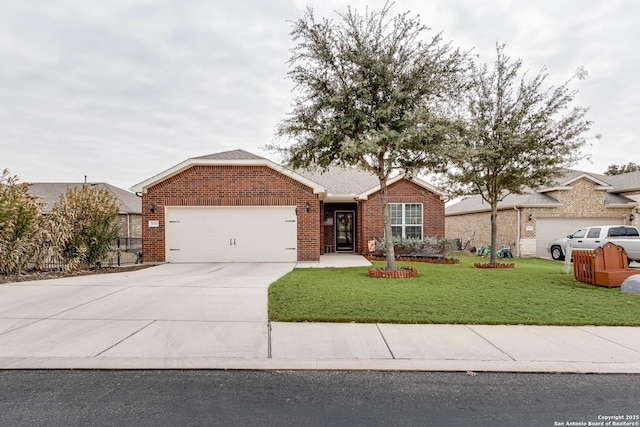 single story home with a garage, concrete driveway, brick siding, and a front lawn