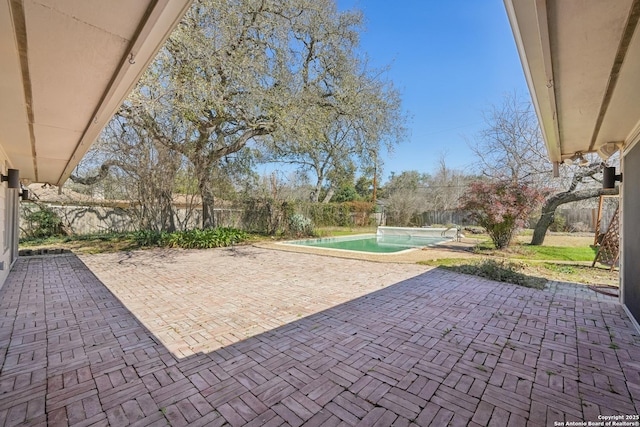 view of patio with a fenced backyard and a fenced in pool