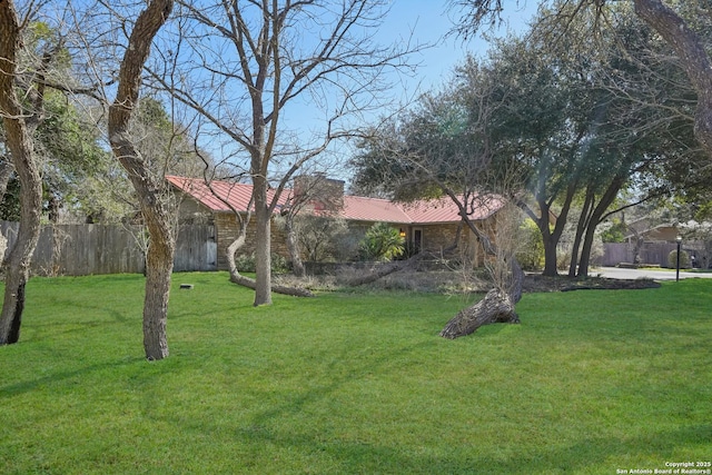 view of yard with fence