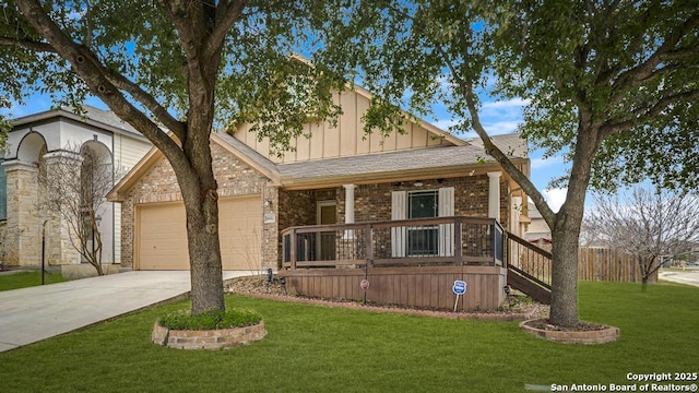 view of front of property featuring brick siding, an attached garage, board and batten siding, driveway, and a front lawn