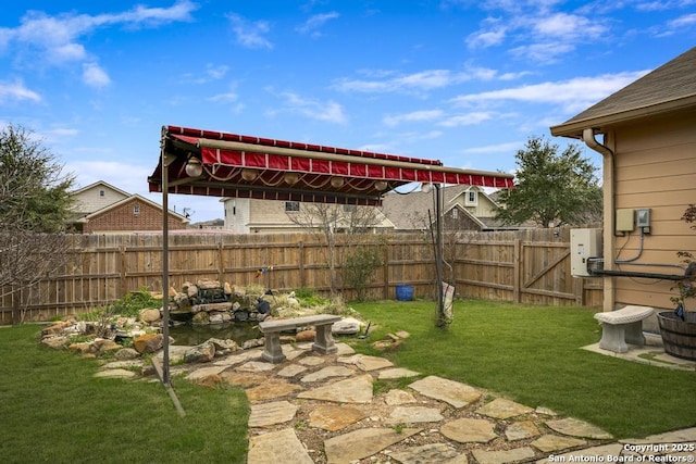 view of yard featuring fence