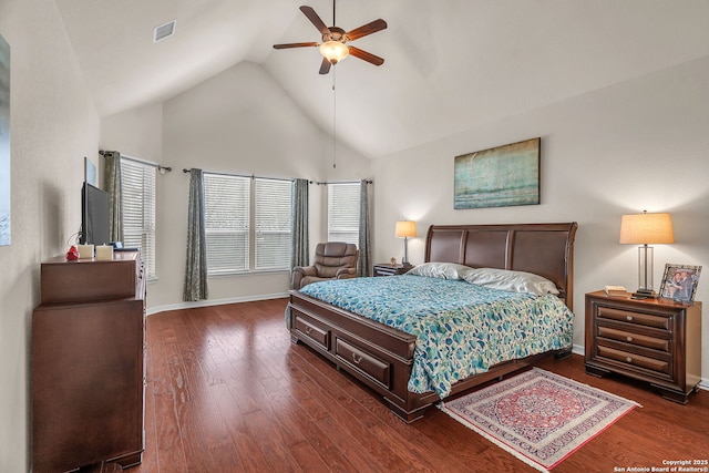 bedroom with dark wood-style floors, visible vents, high vaulted ceiling, and baseboards