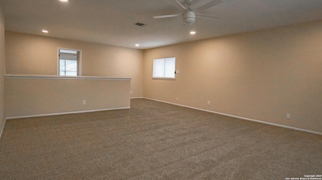 unfurnished room with a ceiling fan, recessed lighting, baseboards, and carpet