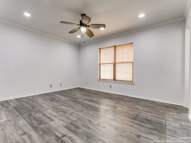 spare room with baseboards, dark wood-style floors, ceiling fan, crown molding, and recessed lighting