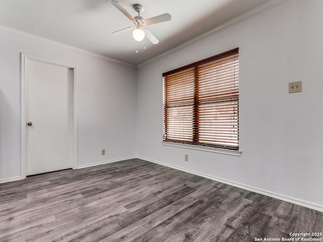 unfurnished room with baseboards, wood finished floors, a ceiling fan, and crown molding