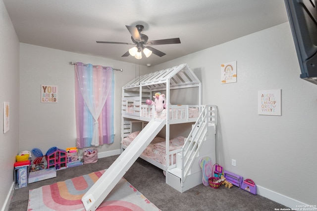 bedroom featuring ceiling fan, baseboards, and dark colored carpet