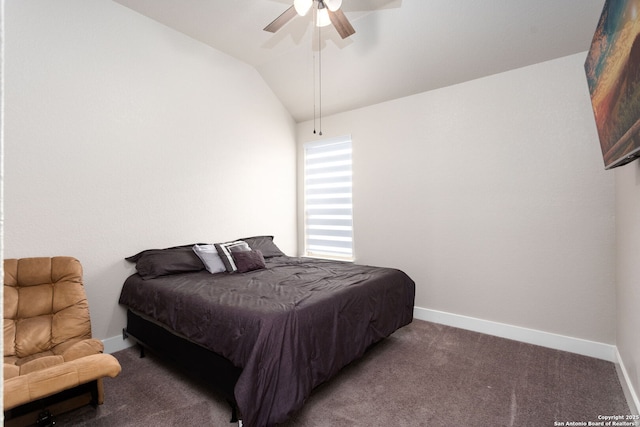 bedroom featuring a ceiling fan, lofted ceiling, dark carpet, and baseboards