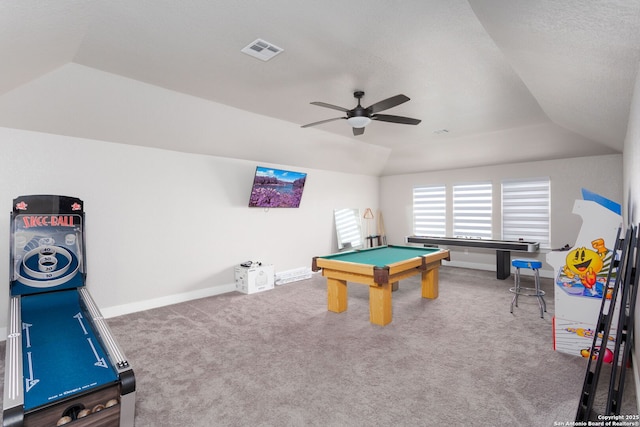 playroom featuring carpet floors, lofted ceiling, visible vents, a ceiling fan, and baseboards