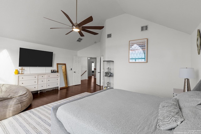 bedroom featuring dark wood-type flooring, visible vents, high vaulted ceiling, and a ceiling fan