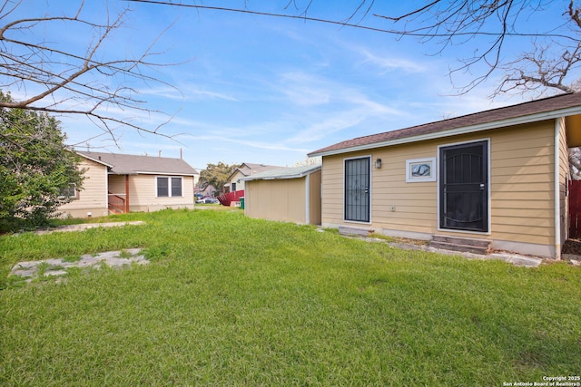 view of yard featuring entry steps