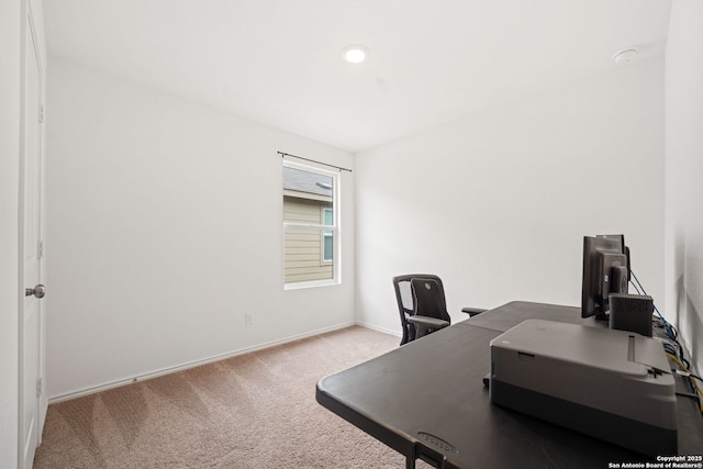 office with carpet floors and baseboards