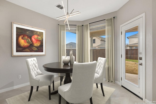 dining area with visible vents, a notable chandelier, baseboards, and light tile patterned floors