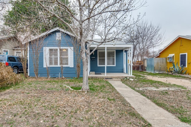 bungalow-style home with a porch