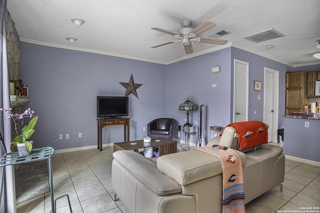 living area with a ceiling fan, visible vents, and crown molding