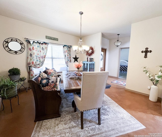 dining room featuring carpet flooring and a notable chandelier