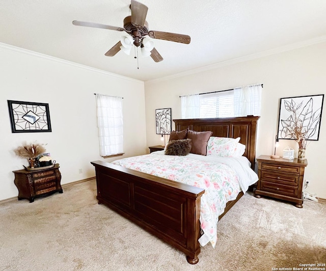 bedroom featuring a ceiling fan, crown molding, and light colored carpet