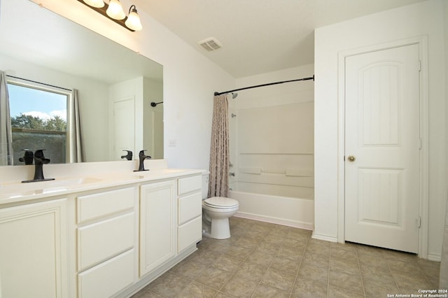 bathroom featuring double vanity, shower / bath combo with shower curtain, a sink, and visible vents