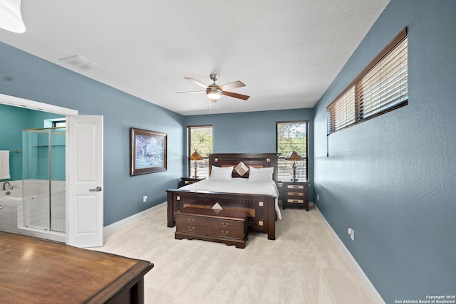 bedroom featuring baseboards, light carpet, visible vents, and ceiling fan