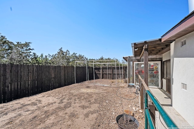 view of yard with visible vents and a fenced backyard