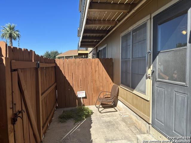 view of patio with fence
