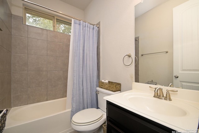 bathroom featuring shower / bathtub combination with curtain, toilet, and vanity