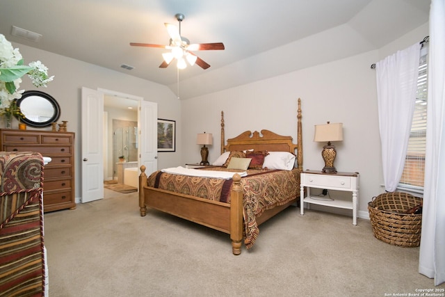 bedroom with lofted ceiling, ceiling fan, visible vents, and light colored carpet