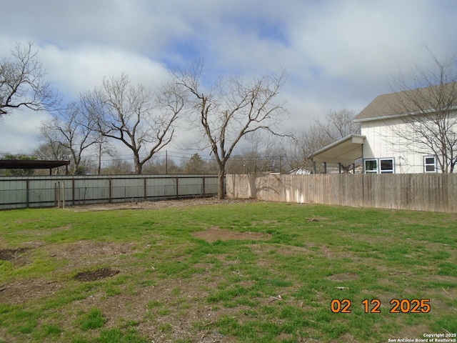 view of yard featuring fence