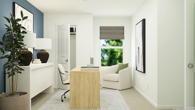 sitting room featuring light colored carpet and baseboards