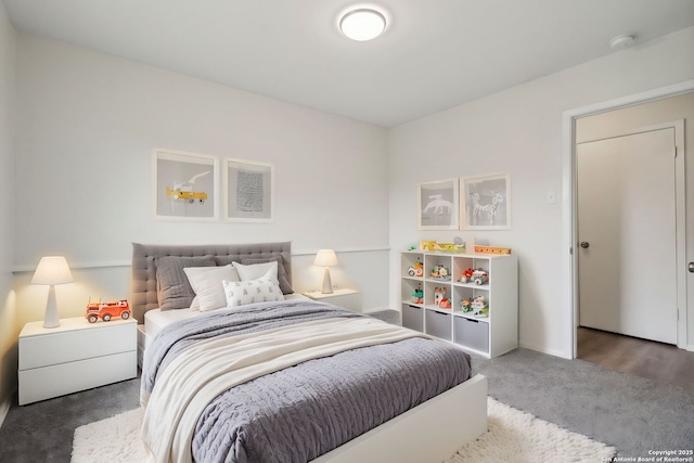 bedroom with dark carpet