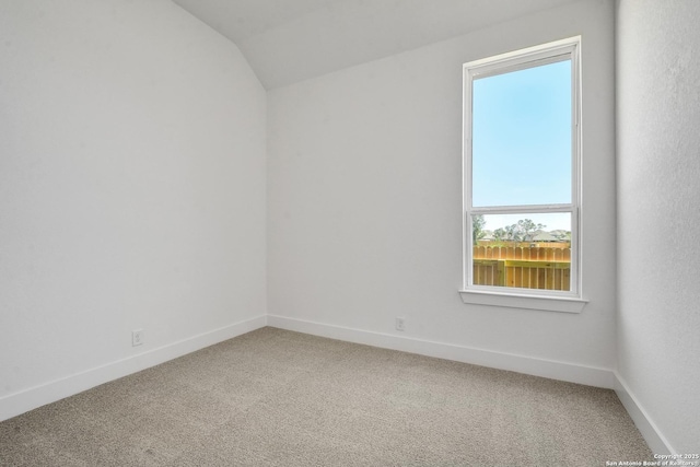 11717 Warlock, San Antonio, TX 78254 - carpeted empty room with lofted ceiling and baseboards