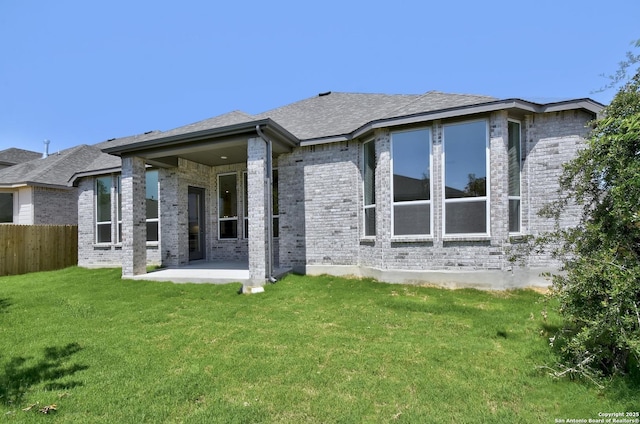 11717 Warlock, San Antonio, TX 78254 - back of property featuring brick siding and a patio area