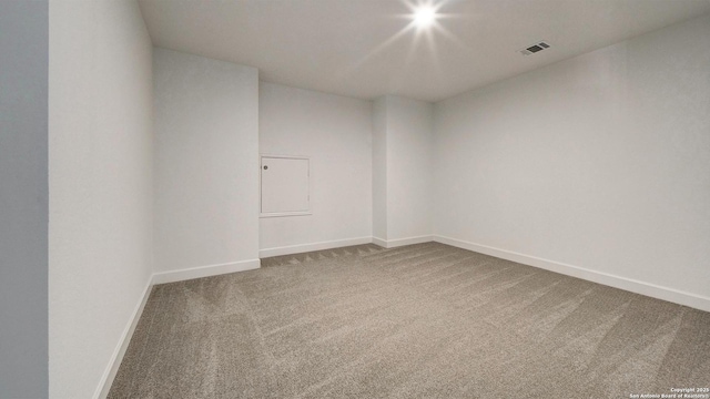 12322 Fort Jyn, San Antonio, TX 78245 - carpeted empty room featuring baseboards