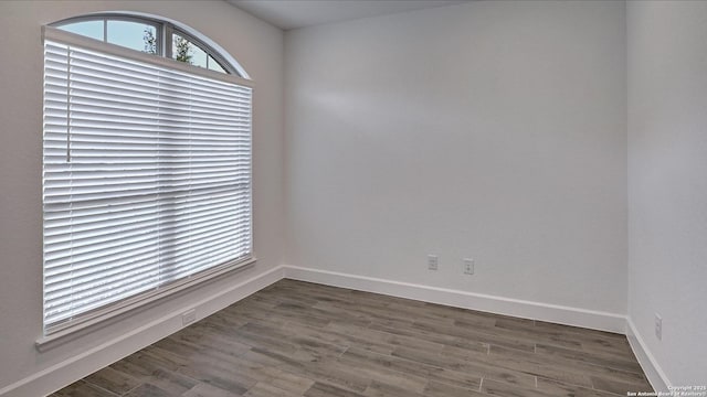 12322 Fort Jyn, San Antonio, TX 78245 - empty room featuring wood finished floors and baseboards