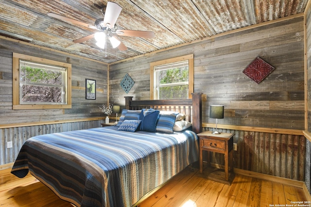 bedroom featuring wood ceiling and wood finished floors