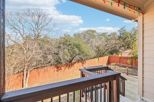 view of wooden balcony with a deck