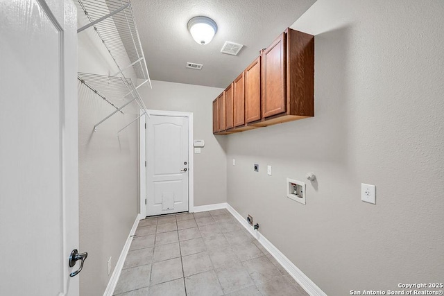 laundry room with hookup for a gas dryer, washer hookup, visible vents, and cabinet space