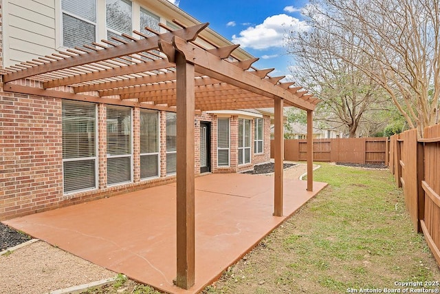 view of patio featuring a fenced backyard and a pergola