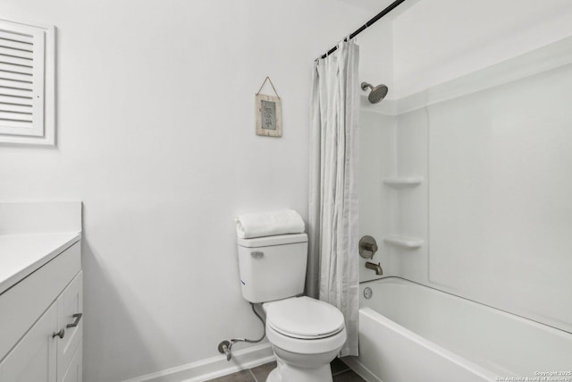 full bath featuring shower / tub combo, baseboards, vanity, and toilet