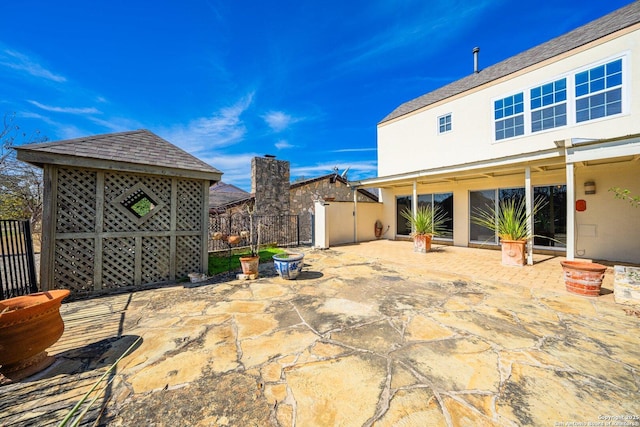 view of patio / terrace with fence