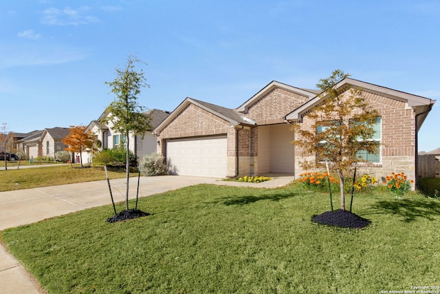 ranch-style home featuring a garage, driveway, brick siding, and a front lawn