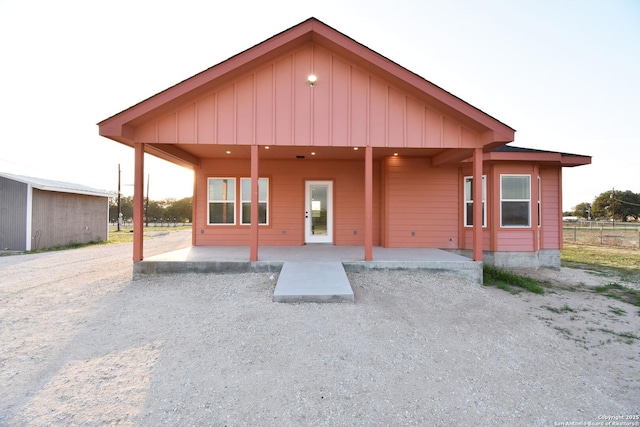 view of front of house with a patio area