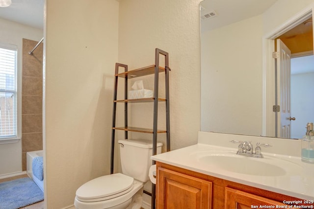 full bath featuring toilet, bathtub / shower combination, vanity, and visible vents