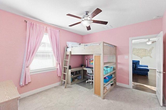 bedroom with carpet floors, baseboards, and visible vents