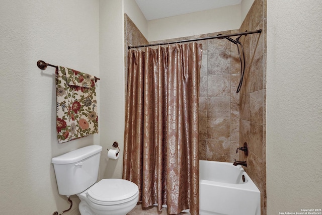 bathroom with shower / bath combination with curtain and toilet