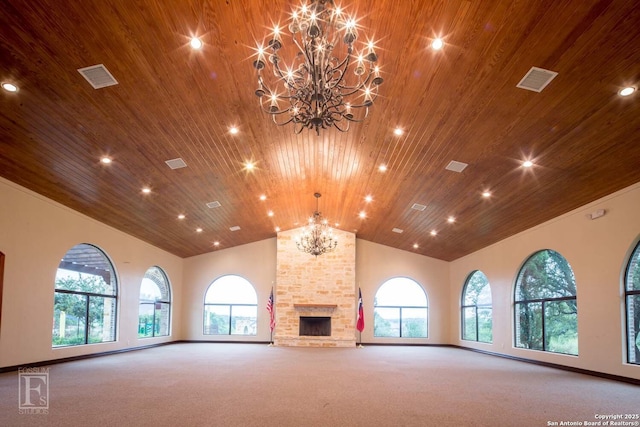 unfurnished living room featuring carpet floors, wooden ceiling, visible vents, and an inviting chandelier