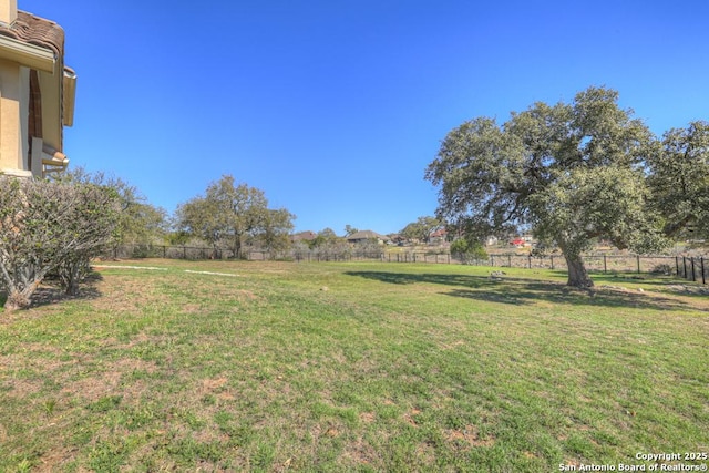 view of yard with fence